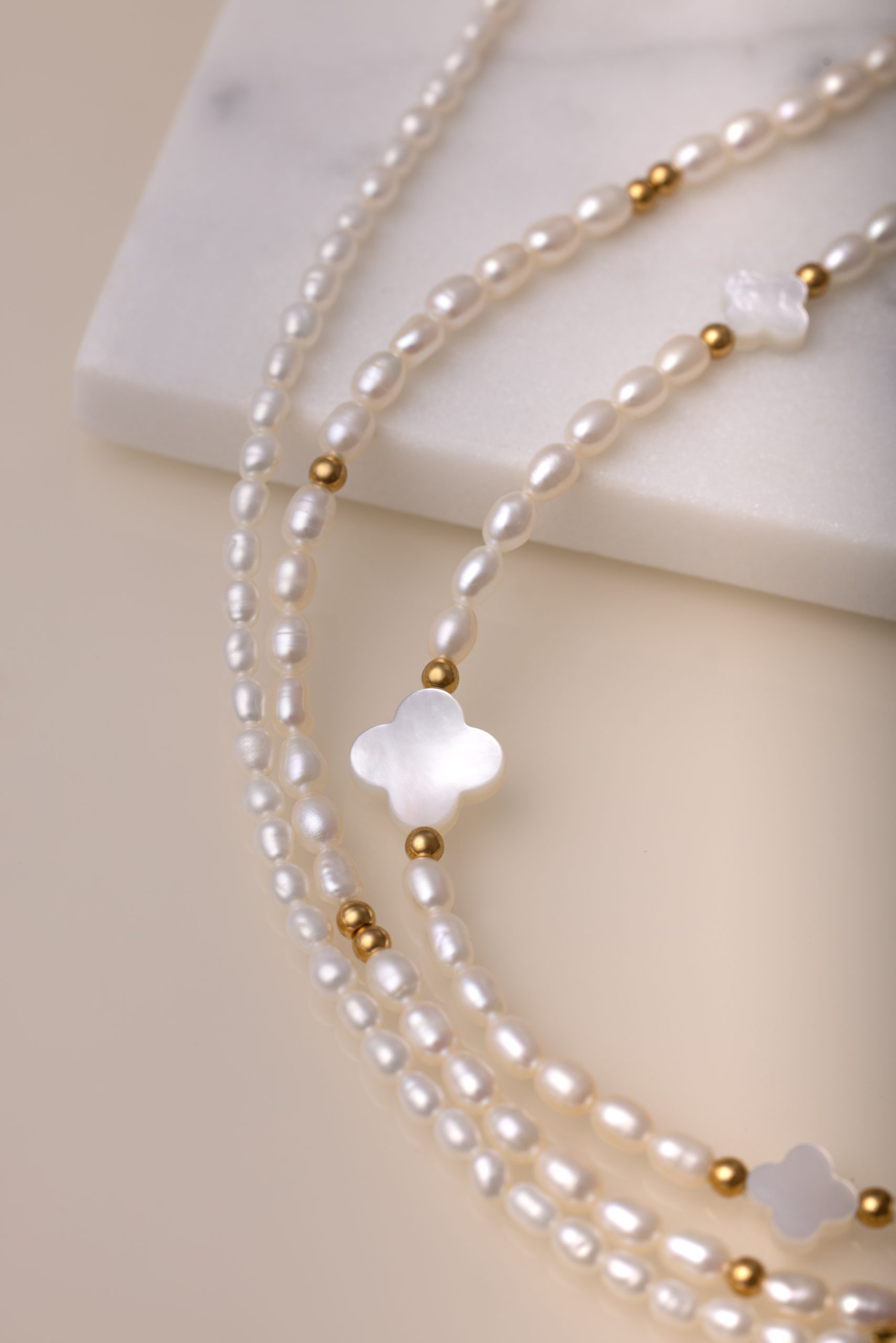 Pearl Necklace with Clover Charms